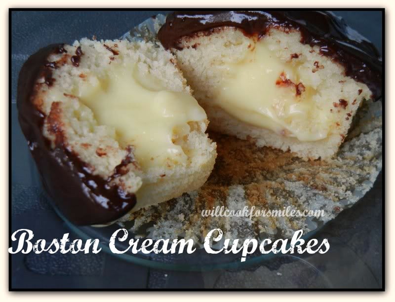 cupcake cut in half with boston cream inside and chocolate on top 