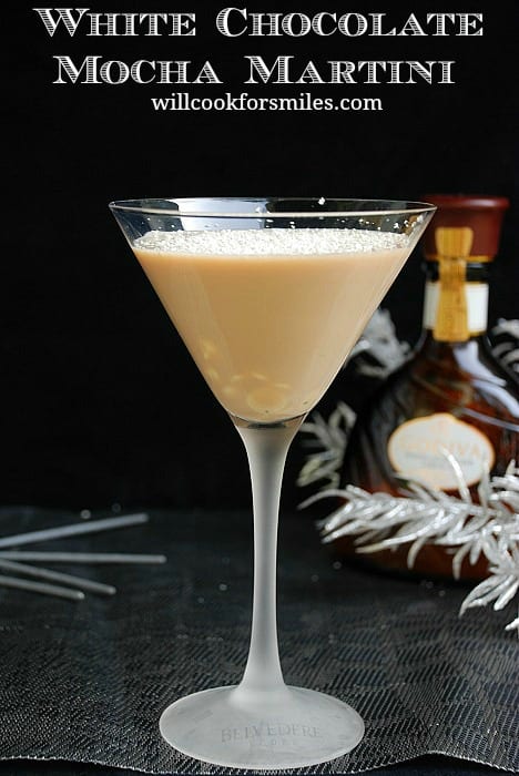 White Chocolate Mocha Martini in a martini glass on a black table top 