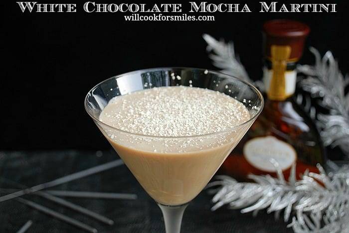 White Chocolate Mocha Martini in a martini glass with white chocolate shavings on top 