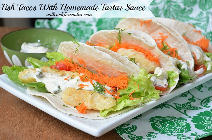 Fish tacos with homemade on a plate with tartar sauce in a bowl 