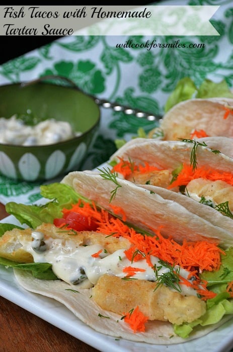 Fish tacos with homemade on a plate with tartar sauce in a bowl 