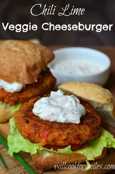 chili lime veggie cheeseburger on a bun with lettuce and chili lime cream sauce 