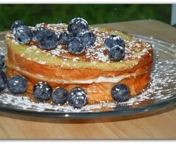 blueberry cake on glass plate