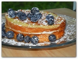 blueberry cake on glass plate