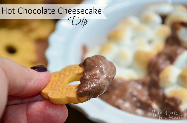 cookie dipped into Hot Chocolate Cheesecake Dip 