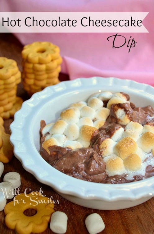 chocolate dip with melted marshmallows on top in a white bowl 