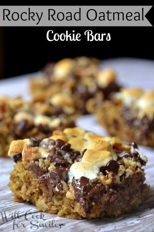 Rocky road oatmeal cookie bars with melted chocolate and marshmallows on top 