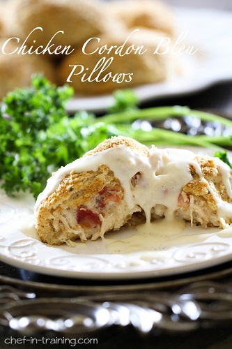 Chicken Cordon Bleu pillows on a white plate 