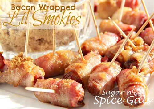 bacon brown sugar wrapped smokies with tooth picks on a plate 