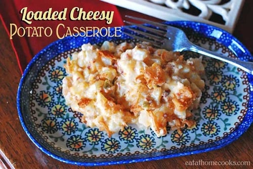 cheesy potato casserole on a blue plate 