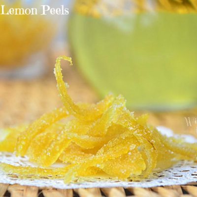 sugar coated lemon peels on a white decorative napkin