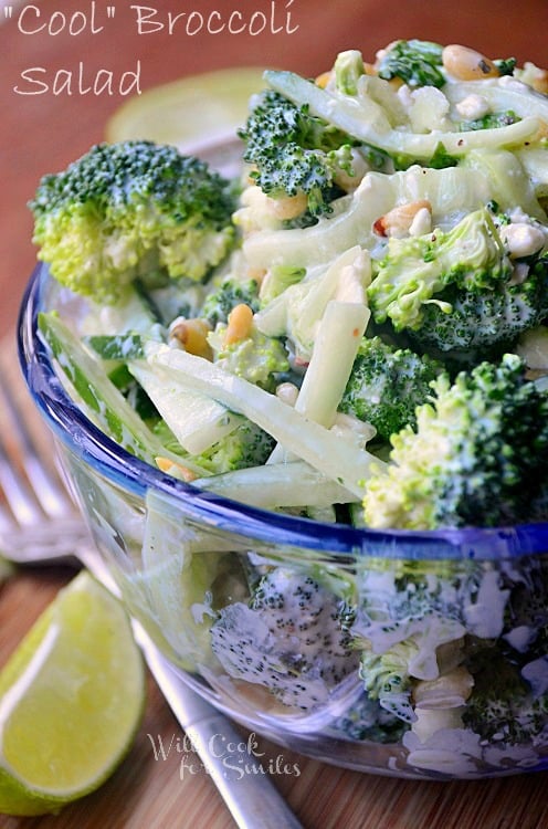 broccoli salad in a clear glass bowl 