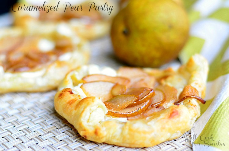 Caramelized Pear Pastry on a wicker placemat with pears at the top of it 