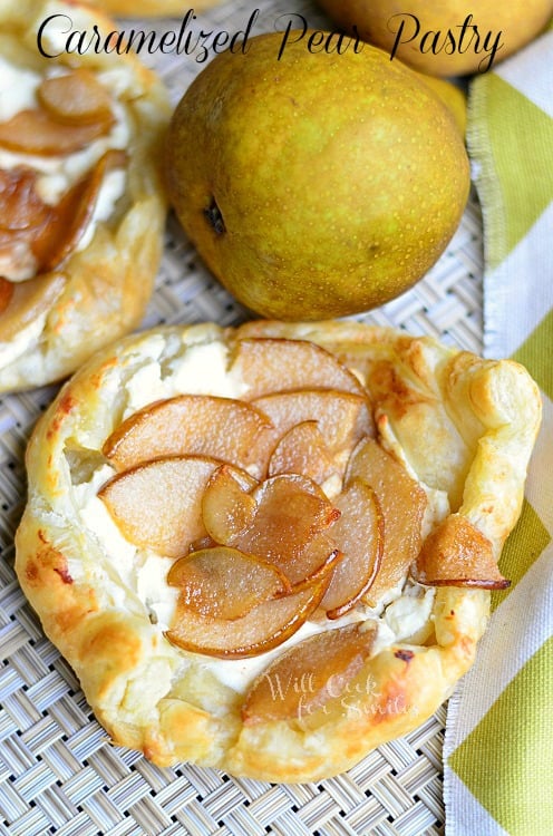 above photo of Caramelized Pear Pastry on a wicker placemat with pears at the top of it 