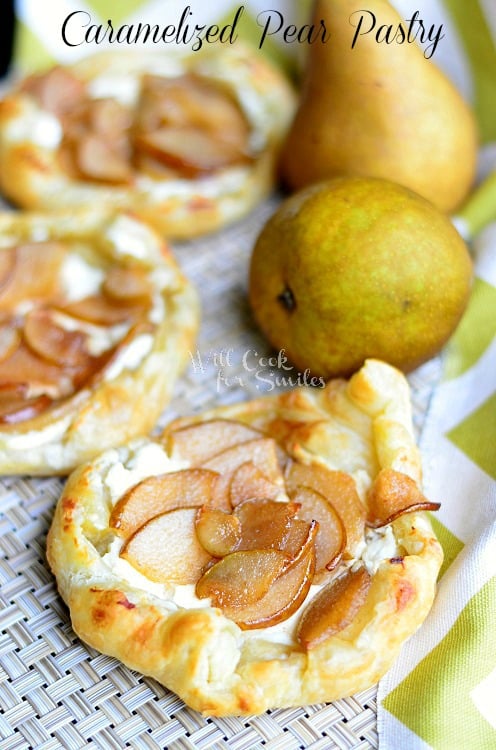 Caramelized Pear Pastry on a wicker placemat with pears at the top of it 