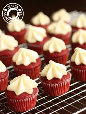 red velvet cupcakes on a cooling rack 