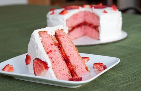 strawberry cake on a white plate 