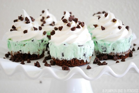 Ice Cream Cupcakes with chocolate chips on top on a cake stand 