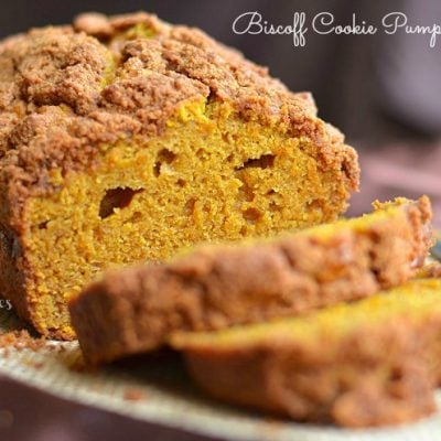 close up view of sliced biscoff cookie pumpkin bread on burlap placemat
