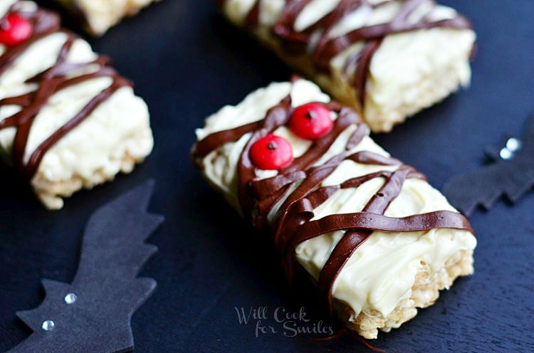Rice Krispie Mummies with chocolate drizzle and red candy eyes 