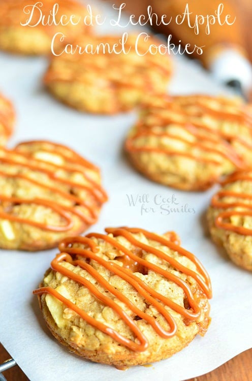 Dulce de Leche Apple Caramel Oatmeal Cookies. Wonderful fall homemade cookie recipe. These are soft oatmeal cookies made with apples, chewy caramel chunks, and drizzled withn Dulce de Leche. #homemade #cookies #applecaramel #apple #oatmeal #caramel