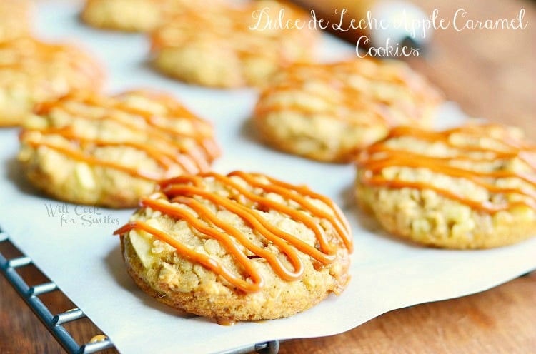 Dulce de Leche Apple Caramel Oatmeal Cookies. Wonderful fall homemade cookie recipe. These are soft oatmeal cookies made with apples, chewy caramel chunks, and drizzled withn Dulce de Leche. #homemade #cookies #applecaramel #apple #oatmeal #caramel