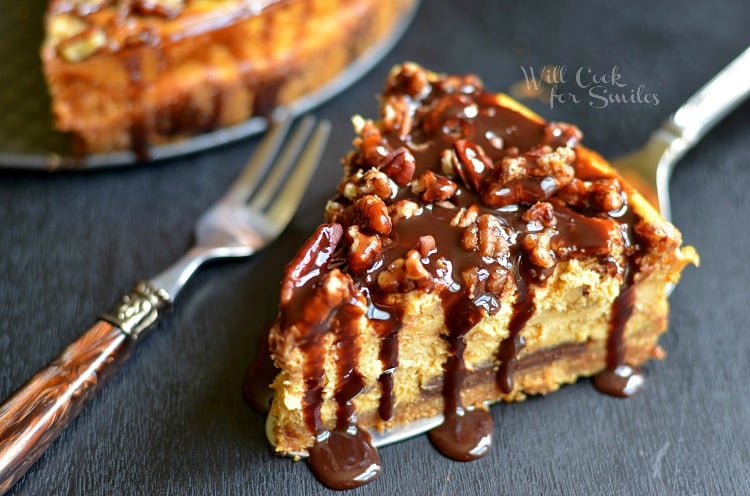 slice of Pumpkin Chocolate Cheesecake Recipe on a table with a fork 