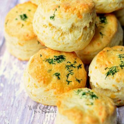 stack three cheese dinner scones on wood table