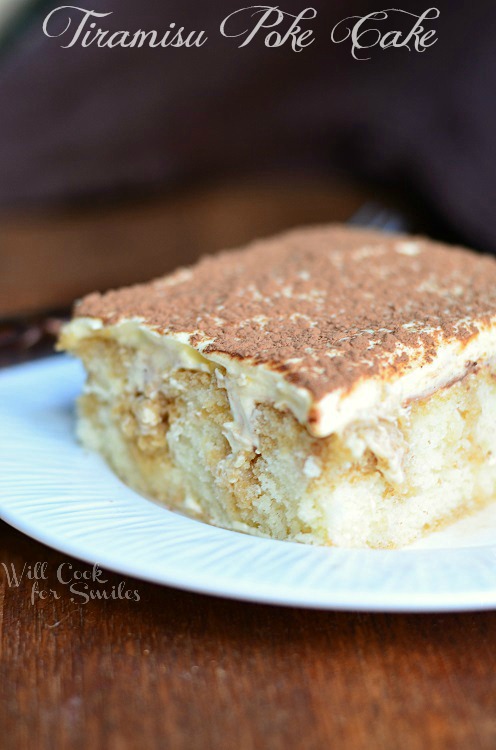 Tiramisu Poke Cake slice on a white plate 