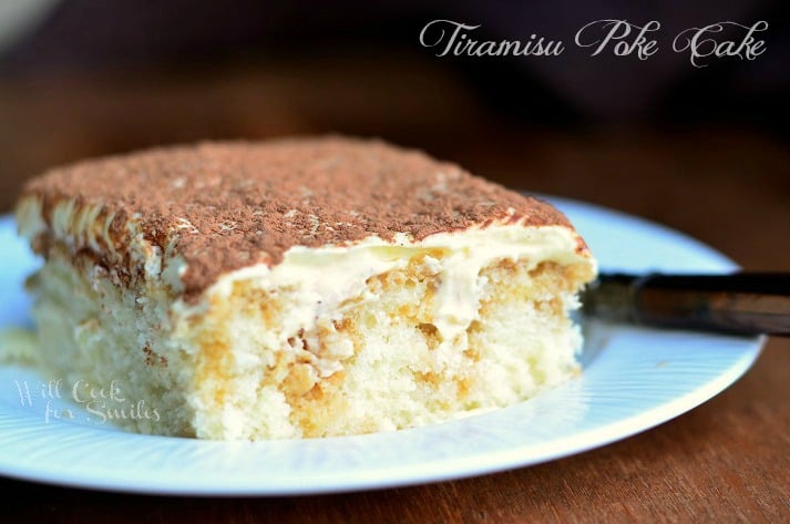 horizonal photo of Tiramisu Poke Cake slice on white plate 