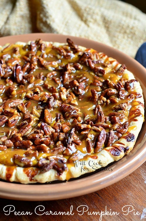 Pecan Caramel Pumpkin Cheesecake Pie in a brown pie pan 