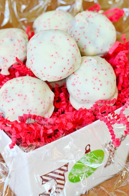 Peppermint Oreo Bites in a christmas joy box with red paper 