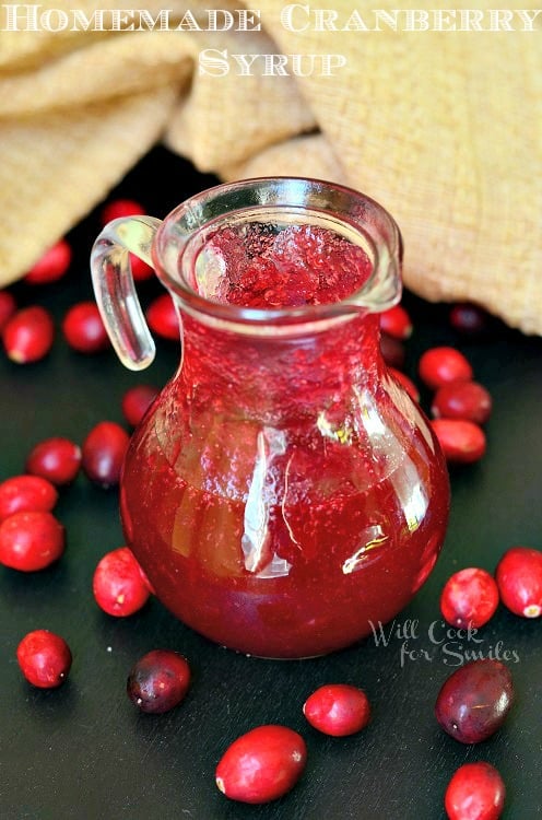 Cranberry Syrup in a glass pitcher 