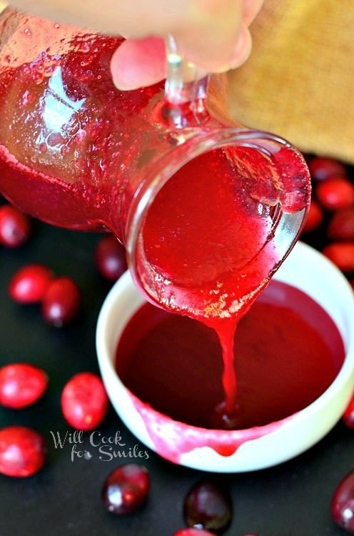 pouring syrup into a white bowl 