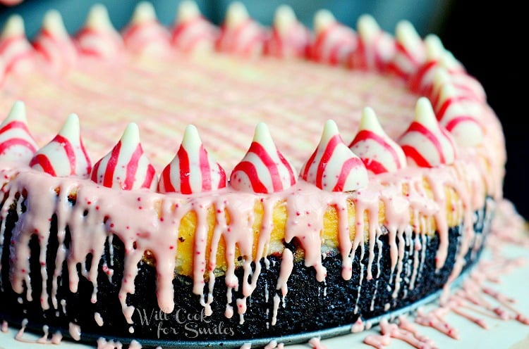 close up horizonal photo Peppermint Cheesecake with peppermint kisses along the outside and  with Oreo Cake Crust 