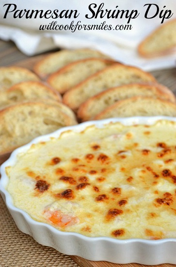 parmesan shrimp dip with slices of bread 