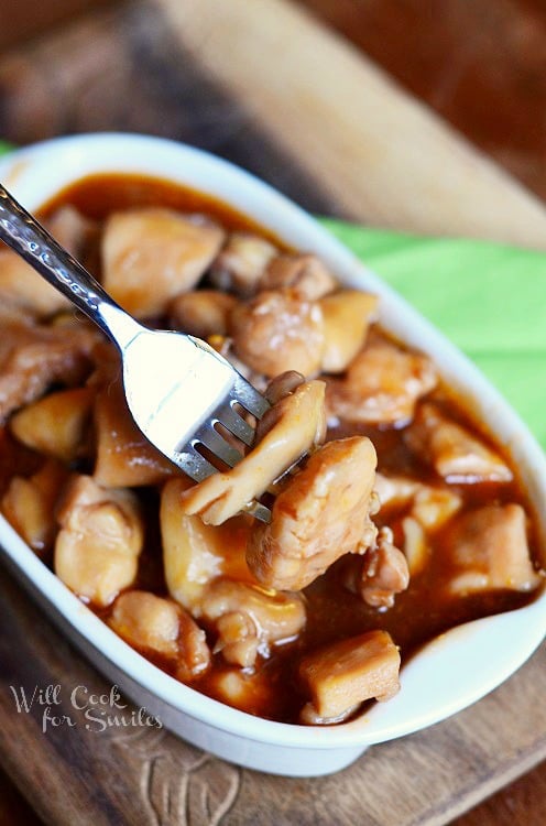Bourbon Chicken with some on a fork 