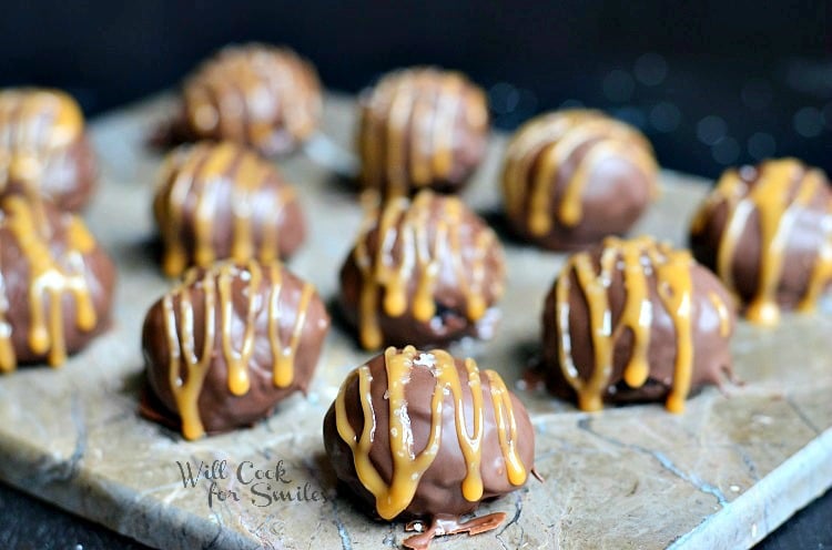 Salted Caramel Brownie Truffles on a cutting board 