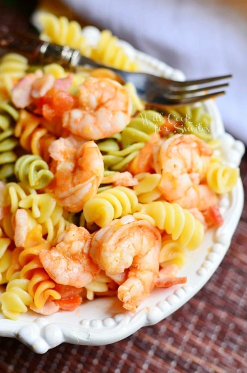 Chipotle Shrimp Bacon & Tomato Pasta in a bowl with a fork on the top 