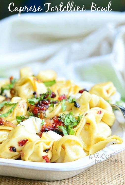 Caprese Tortellini in a white bowl 