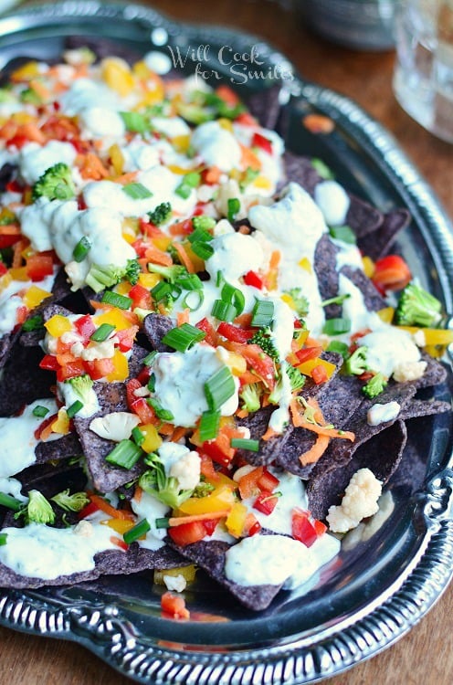 Veggie Nachos on a silver plate 