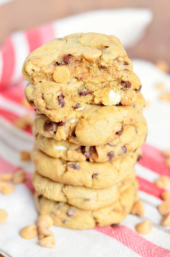 Gooey Loaded Peanut Butter Cookies stacked up together 