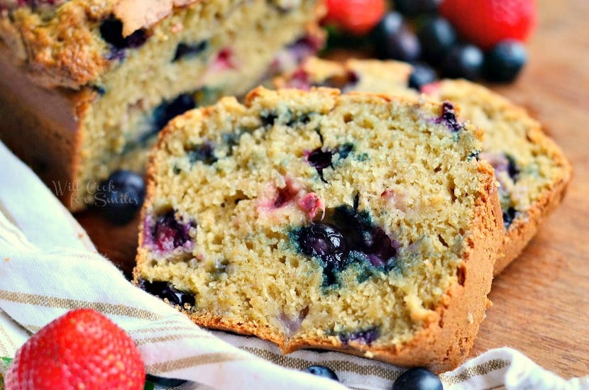 slices of berry bread with strawberry and blueberries 