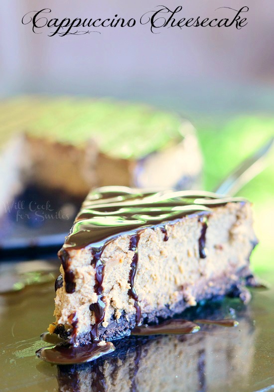 slice of cheesecake on a black counter 