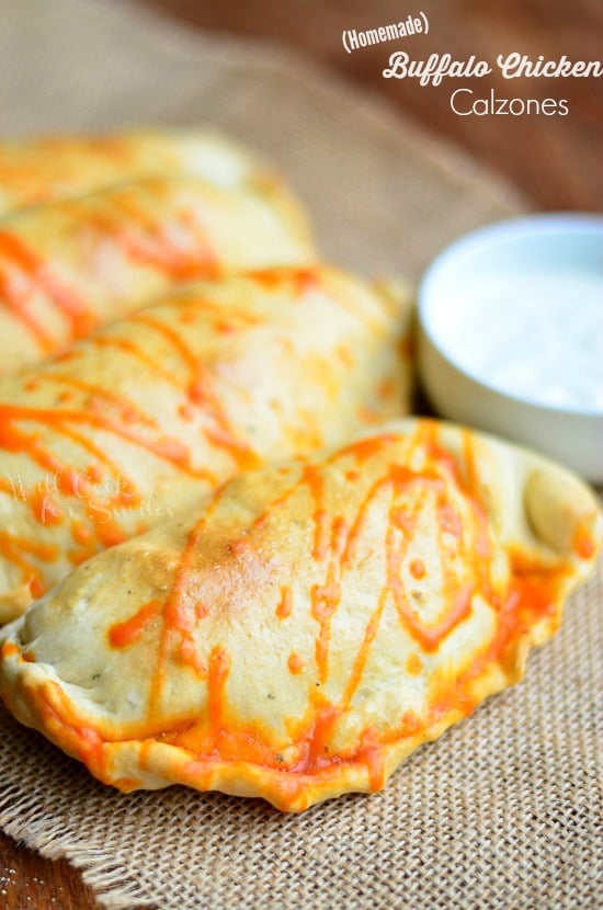 Buffalo Chicken Calzones on a brown table clothe 