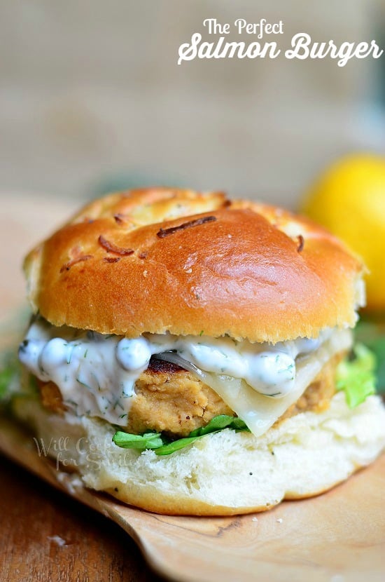 The Perfect Salmon Burger. Delicious salmon patty served on an onion roll, with picked, cheese and topped with caper dill sauce!! willcookforsmiles.com