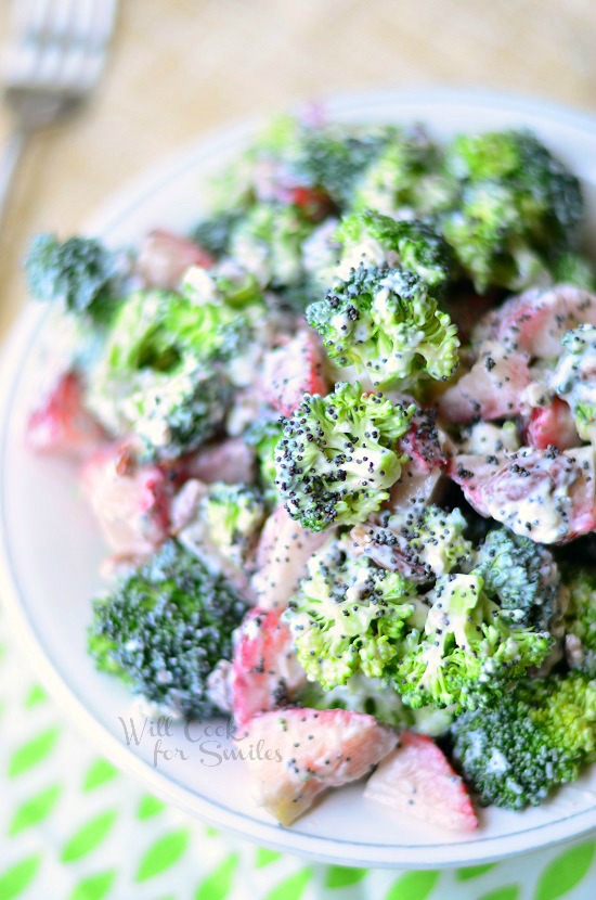 Strawberry Broccoli Salad in a clear glass bowl 