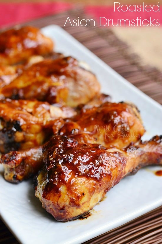Asian Roasted Drumsticks on white serving plate 