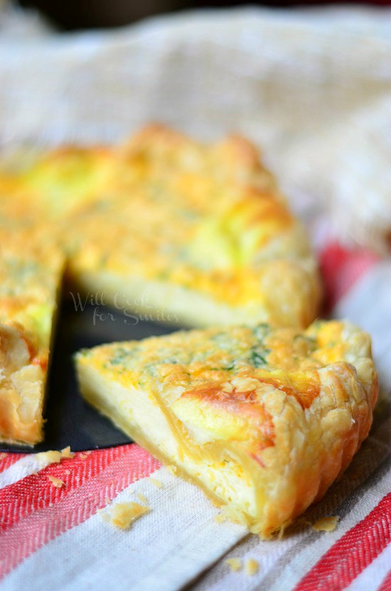 Four Cheese Souffle slice on a red and white towel 