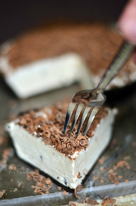 slice of Mocha Ice Cream Pie with a fork cutting into it. 
